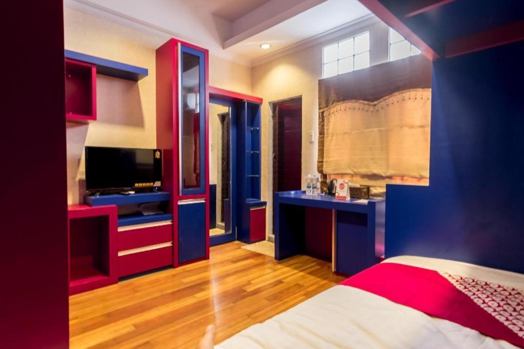 Oyo 619 Naufal Guest House Syariah 棉兰 外观 照片