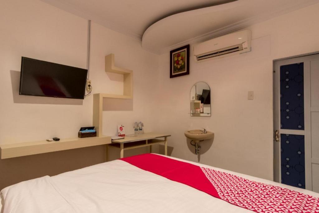 Oyo 619 Naufal Guest House Syariah 棉兰 外观 照片