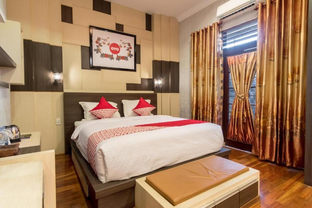 Oyo 619 Naufal Guest House Syariah 棉兰 外观 照片