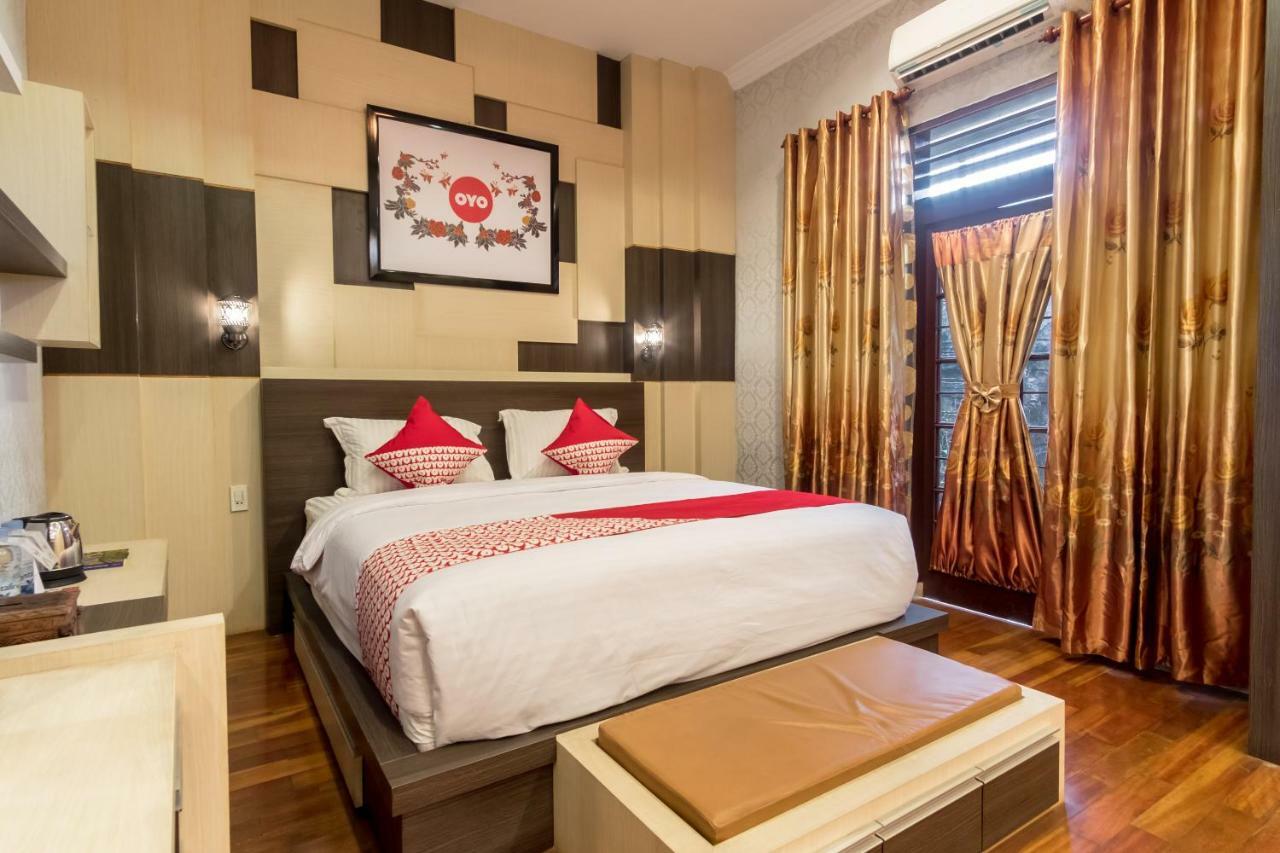 Oyo 619 Naufal Guest House Syariah 棉兰 外观 照片