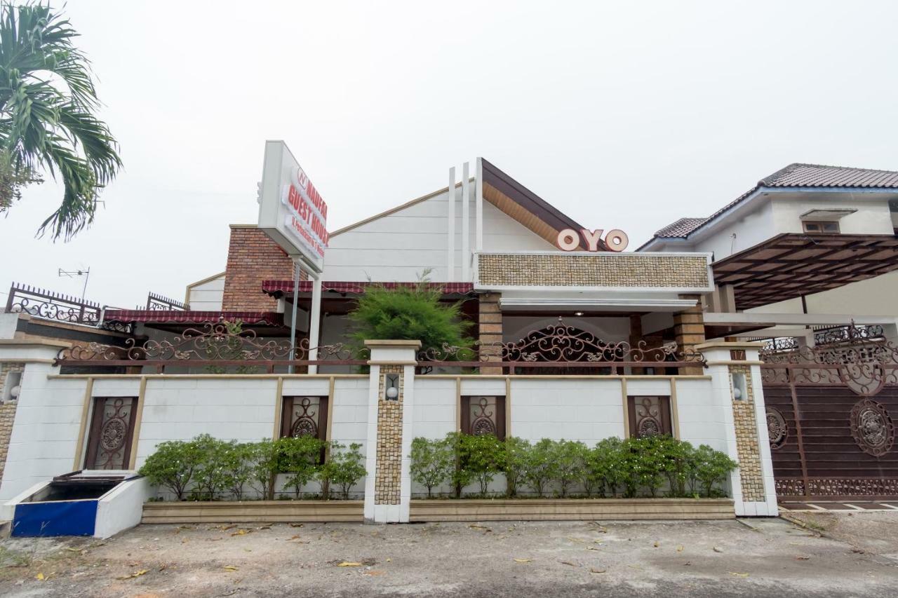 Oyo 619 Naufal Guest House Syariah 棉兰 外观 照片