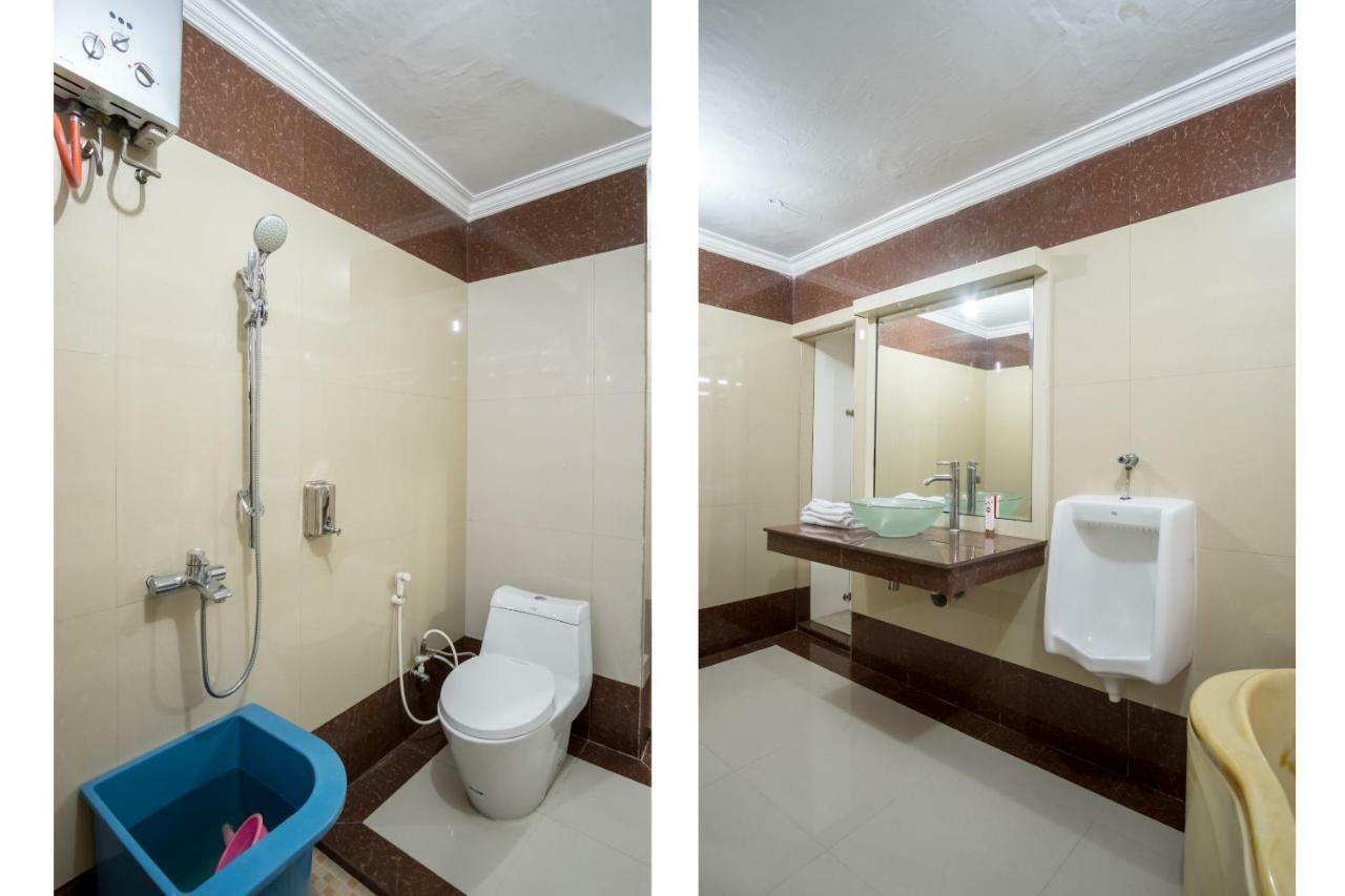 Oyo 619 Naufal Guest House Syariah 棉兰 外观 照片